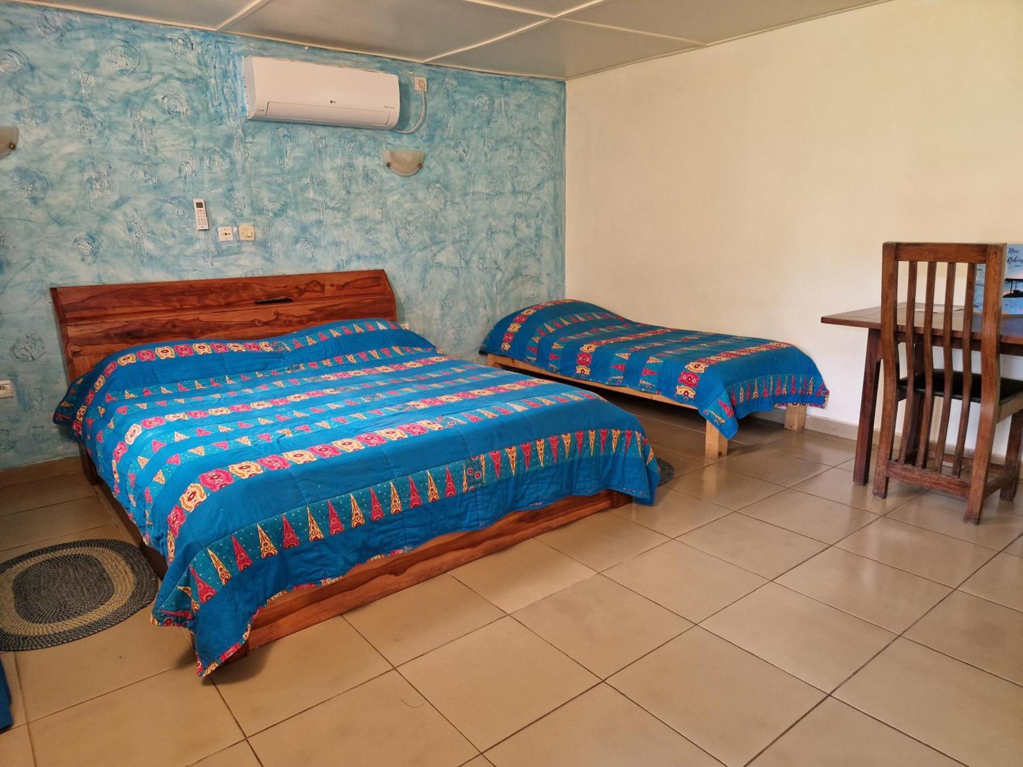 Hotel Robinson Plage Lomé Quarto foto